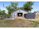 Open barn entrance with a shed attached and fencing at 1781 Se 85Th Street Rd, Ocala, FL 34480
