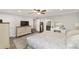 Comfortable bedroom with dresser, makeup counter, and neutral color palette at 1781 Se 85Th Street Rd, Ocala, FL 34480