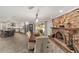 Elegant dining room features a brick fireplace and an open floor plan at 1781 Se 85Th Street Rd, Ocala, FL 34480
