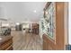 Open-concept home interior showing a bright living space, dining area, and a modern kitchen, viewed from front door at 1781 Se 85Th Street Rd, Ocala, FL 34480
