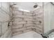 Close up on tiled shower with a shower head and a hand held shower at 1781 Se 85Th Street Rd, Ocala, FL 34480
