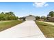 Charming single-story home with a spacious driveway and attached two-car garage at 2114 W Magenta Dr, Citrus Springs, FL 34434