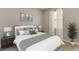 Comfortable bedroom with a plush bed, stylish decor, and soft natural light at 3076 Canopy Oak Blvd, Wildwood, FL 34785