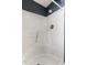 Standing shower with a built in seat and shower head at 3112 Se 140Th Ln, Summerfield, FL 34491