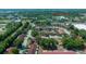 Overhead view of residential community with mature trees, Central Florida College nearby, and well-maintained landscaping at 3449 Sw 19Th St, Ocala, FL 34474