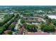 Aerial view displaying the property's surroundings, highlighting the community and nearby trees at 3449 Sw 19Th St, Ocala, FL 34474