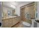 Bathroom with a single sink vanity, an enclosed tiled shower and toilet at 3449 Sw 19Th St, Ocala, FL 34474