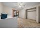 Well-lit bedroom showcases a spacious closet, neutral walls, and a comfortable daybed for versatile use at 3449 Sw 19Th St, Ocala, FL 34474