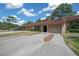 Well-maintained home with an arched entryway and an attached garage set in a tranquil neighborhood at 3449 Sw 19Th St, Ocala, FL 34474