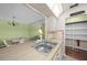 Stainless sink overlooking the dining area, with adjacent pantry storage at 3449 Sw 19Th St, Ocala, FL 34474