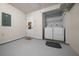 Laundry room with washer, dryer, door to outside, and shelving for storage at 3449 Sw 19Th St, Ocala, FL 34474