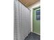 Bathroom featuring a shower with green trimmed door and black and white curtains at 400 Se 45Th Ter, Ocala, FL 34471