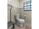Powder room showcasing updated fixtures, and modern color palette at 400 Se 45Th Ter, Ocala, FL 34471