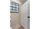 Shower features updated shower curtain, hardware, and updated tiled flooring at 400 Se 45Th Ter, Ocala, FL 34471