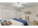 Bedroom featuring a ceiling fan and view of the closet at 400 Se 45Th Ter, Ocala, FL 34471