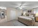 Bedroom features plush carpeting, decorative rug, and a neutral color palette at 400 Se 45Th Ter, Ocala, FL 34471