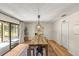 Bright dining room with a stylish table and a sliding glass door at 400 Se 45Th Ter, Ocala, FL 34471