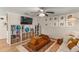 Cozy living room features plush seating, built-in storage, and decor at 400 Se 45Th Ter, Ocala, FL 34471