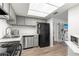 Efficient kitchen features gray cabinets, modern appliances, and neutral color palette at 450 Fairways Cir # A101, Ocala, FL 34472
