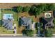 Aerial view showcasing the home's roof, driveway, and surrounding neighborhood at 4735 Se 35Th St, Ocala, FL 34480
