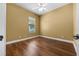 Bedroom with a ceiling fan and a window for natural light at 4735 Se 35Th St, Ocala, FL 34480