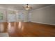 Bright and airy living room with hardwood floors and an open entryway at 4735 Se 35Th St, Ocala, FL 34480