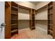 Spacious walk-in closet featuring built-in shelving and ample storage at 4735 Se 35Th St, Ocala, FL 34480