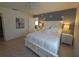 Bright bedroom featuring neutral decor, artwork, and plenty of natural light at 6239 Sw 98Th Loop, Ocala, FL 34476