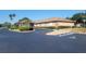 Commercial building with well-manicured landscaping and a convenient driveway at 6239 Sw 98Th Loop, Ocala, FL 34476