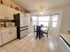 Eat in kitchen features stainless appliances and a breakfast nook with lots of natural light at 6239 Sw 98Th Loop, Ocala, FL 34476