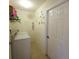 Bright laundry room with modern washer and dryer, and clean design create an efficient space at 6239 Sw 98Th Loop, Ocala, FL 34476