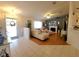 Bright and airy living room featuring wood floors and ample seating at 6239 Sw 98Th Loop, Ocala, FL 34476