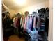 Well-organized walk-in closet featuring ample storage space for clothes, shoes, and accessories at 6239 Sw 98Th Loop, Ocala, FL 34476