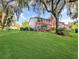 An exterior of the building with a lush green lawn at 700 Midway Dr # B, Ocala, FL 34472