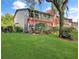 The exterior elevation of the building shows the well-manicured lawn at 700 Midway Dr # B, Ocala, FL 34472