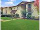 Apartment building with well-maintained lawn, landscaping, and visible unit letter A at 700 Midway Dr # B, Ocala, FL 34472