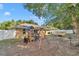 Exterior backyard view, featuring a play set and pool at 72 Dogwood Loop, Ocala, FL 34472
