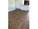 An open living space features tile floors, bright walls, and natural light at 77 Dogwood Drive Pass, Ocala, FL 34472