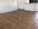 The living room features tile flooring and has a doorway and a closet door at 77 Dogwood Drive Pass, Ocala, FL 34472