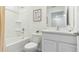 Clean and simple bathroom features a shower and bathtub combo at 8413 Gower Trl, Wildwood, FL 34785