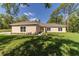 Charming single story home with lush green lawn and fresh landscaping at 8498 Sw 129Th Terrace Rd, Dunnellon, FL 34432