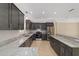 Bright kitchen with granite counters, stainless steel appliances and ample counter space at 8498 Sw 129Th Terrace Rd, Dunnellon, FL 34432