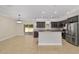Modern kitchen with stainless steel appliances, granite countertops, and a center island at 8498 Sw 129Th Terrace Rd, Dunnellon, FL 34432