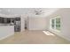 Bright living space featuring tile floors and an open view to the kitchen at 8498 Sw 129Th Terrace Rd, Dunnellon, FL 34432