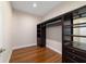 Spacious walk-in closet features built-in shelving, drawers, and ample hanging space for organization at 8498 Sw 129Th Terrace Rd, Dunnellon, FL 34432