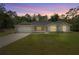 Charming single-story home with a well-manicured lawn and attached garage at 9835 Sw 207Th Cir, Dunnellon, FL 34431