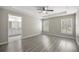 Bright and airy main bedroom with ensuite bath, large window, and tray ceiling at 9835 Sw 207Th Cir, Dunnellon, FL 34431