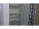 Built-in shelving for linen storage is conveniently located adjacent to shower at 9880 Sw 101St Pl, Ocala, FL 34481