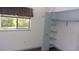 Bedroom with a window and closet for ample natural light and closet space at 9880 Sw 101St Pl, Ocala, FL 34481