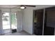 Enclosed patio featuring sliding glass doors and views to the exterior at 9880 Sw 101St Pl, Ocala, FL 34481